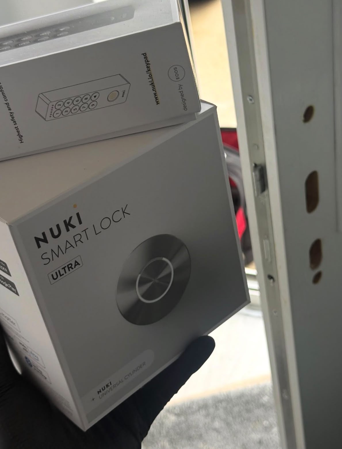 Nuki smart lock kit ready for installation on a uPVC door, Carlton